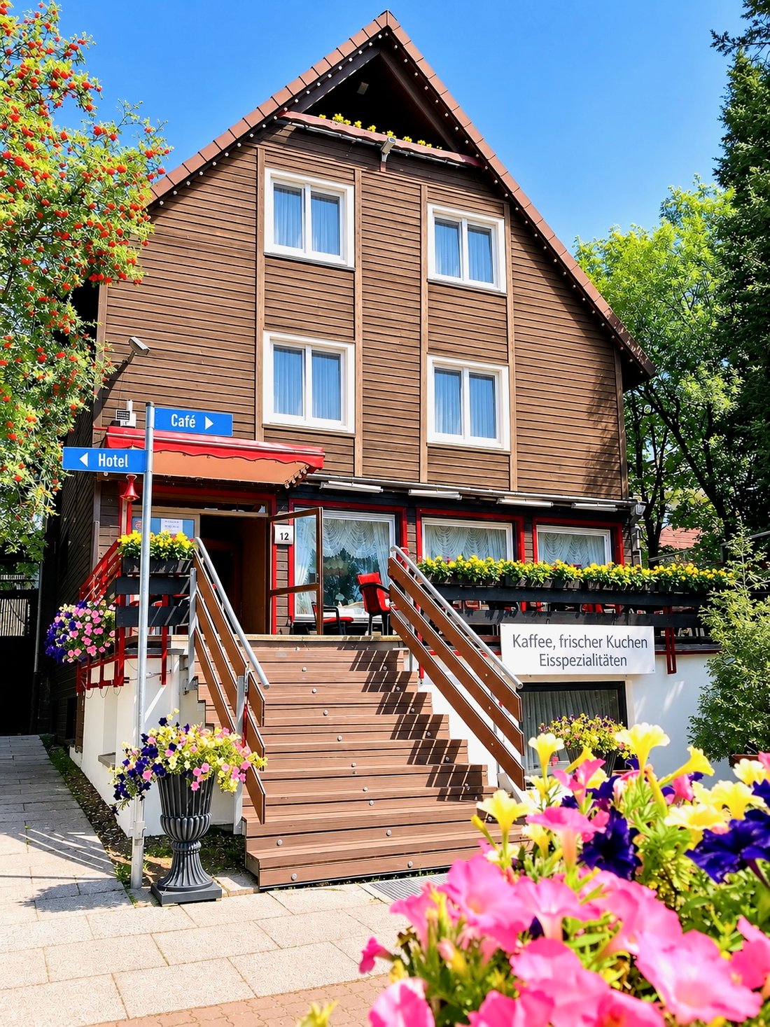 Lakeview Mountain Lodge — Eingang mit Blumen · Entrance with flowers